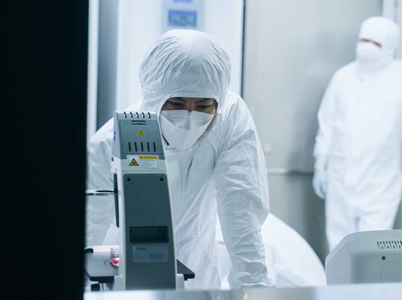 A cell engineer operating equipment in the CPC